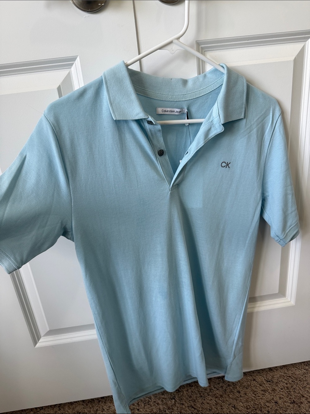 Calvin Klein Light Blue Polo Shirt with CK Logo